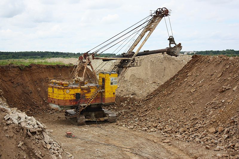 Excavator at oil shale quarry