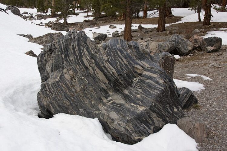 Large chunk of volcanic glass with pumice layers
