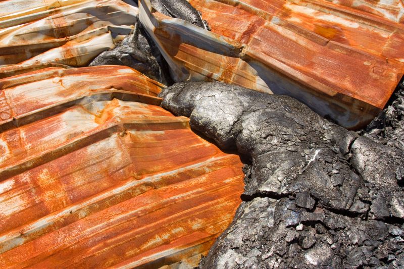 Roof of a house buried under lava flow in Hawaii