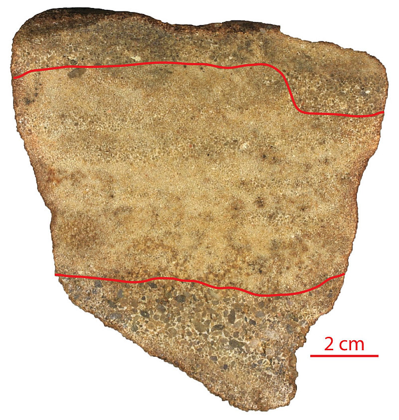 Alternating layers of coarse and fine sandstone.