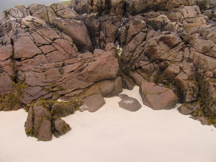 Granite and biogenic sand in Dog's Bay, Ireland.