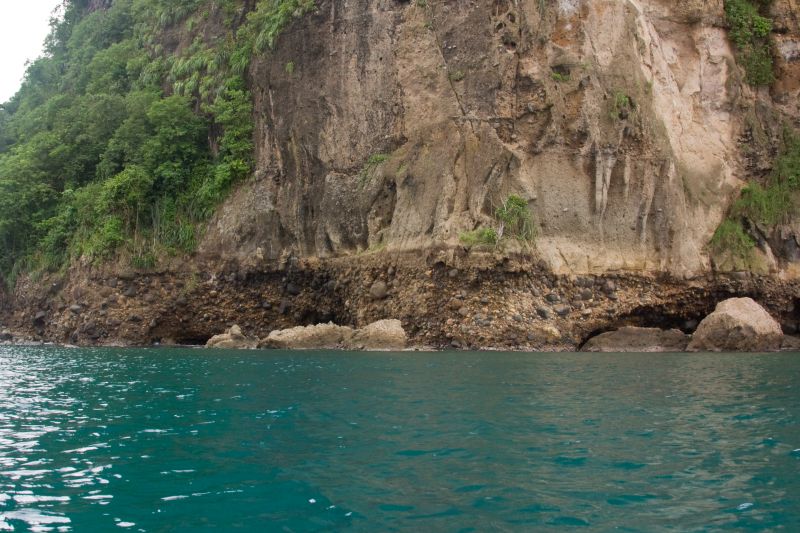 Coastal cliff of Saint Lucia composed of conglomerate and volcanoclastic rocks