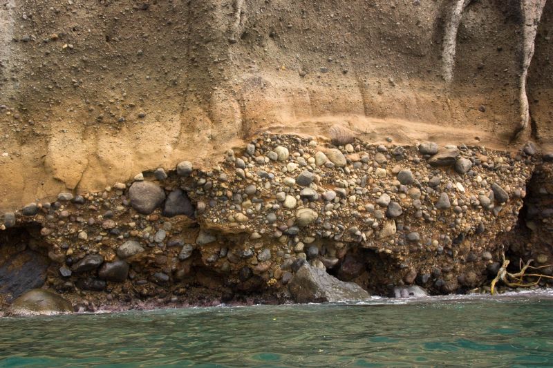 Coastal cliff of Saint Lucia composed of conglomerate and volcanoclastic rocks